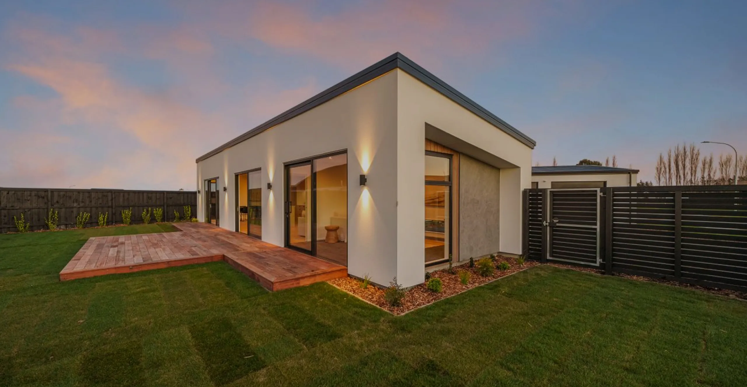 two people and a fox sitting looking happy
